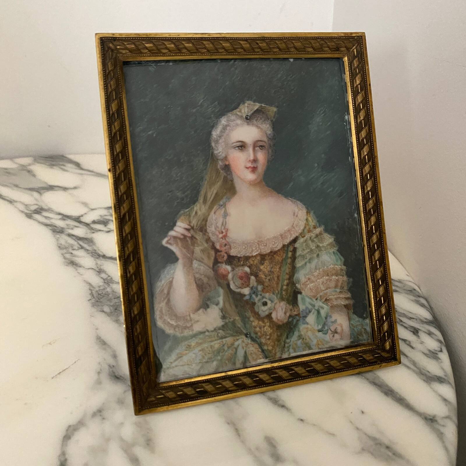 19th-century miniature depicting an 18th-century woman, bronze frame