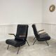 Duo de fauteuils vintage en simili-cuir noir