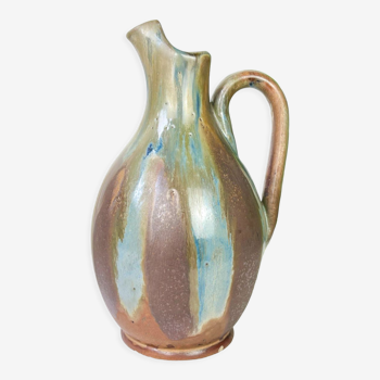 Art Nouveau style carafe in flamed stoneware with blue and brown drips