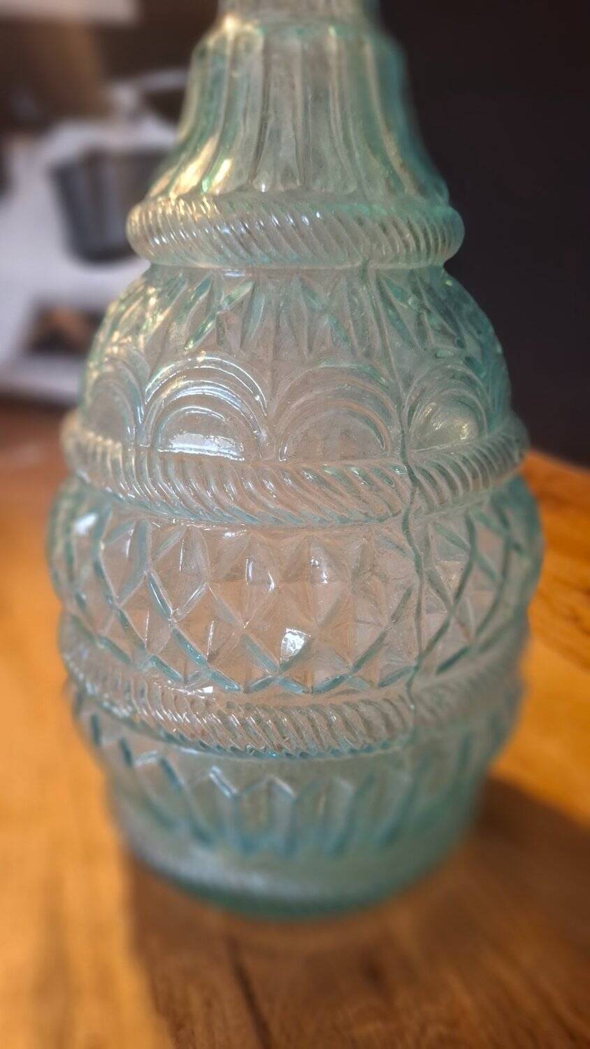 Pair of cut blown glass carafes in blue-green from the 19th century.