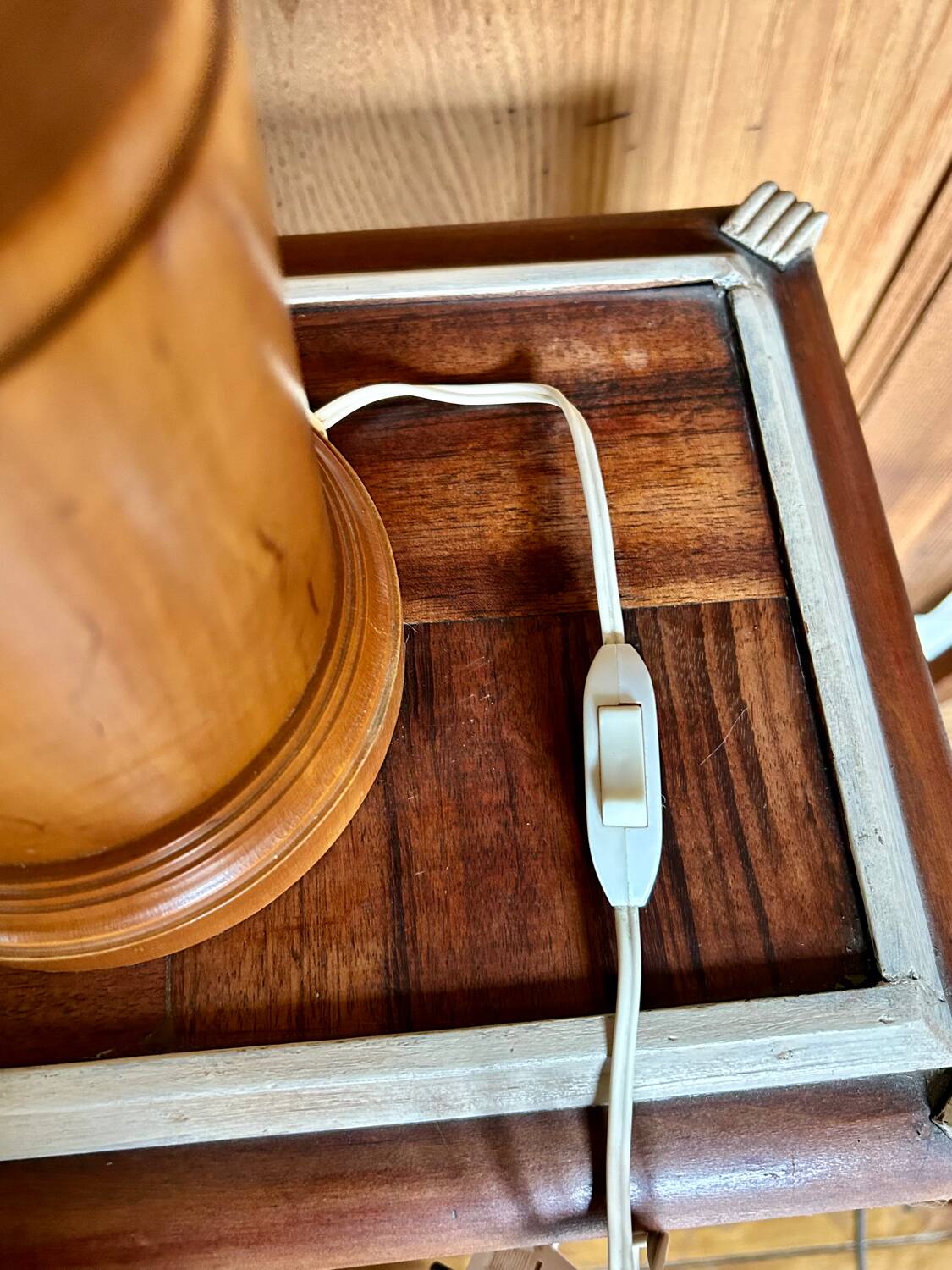 Turned wood base lamp with spun lampshade