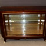 Art Deco period silverware in walnut