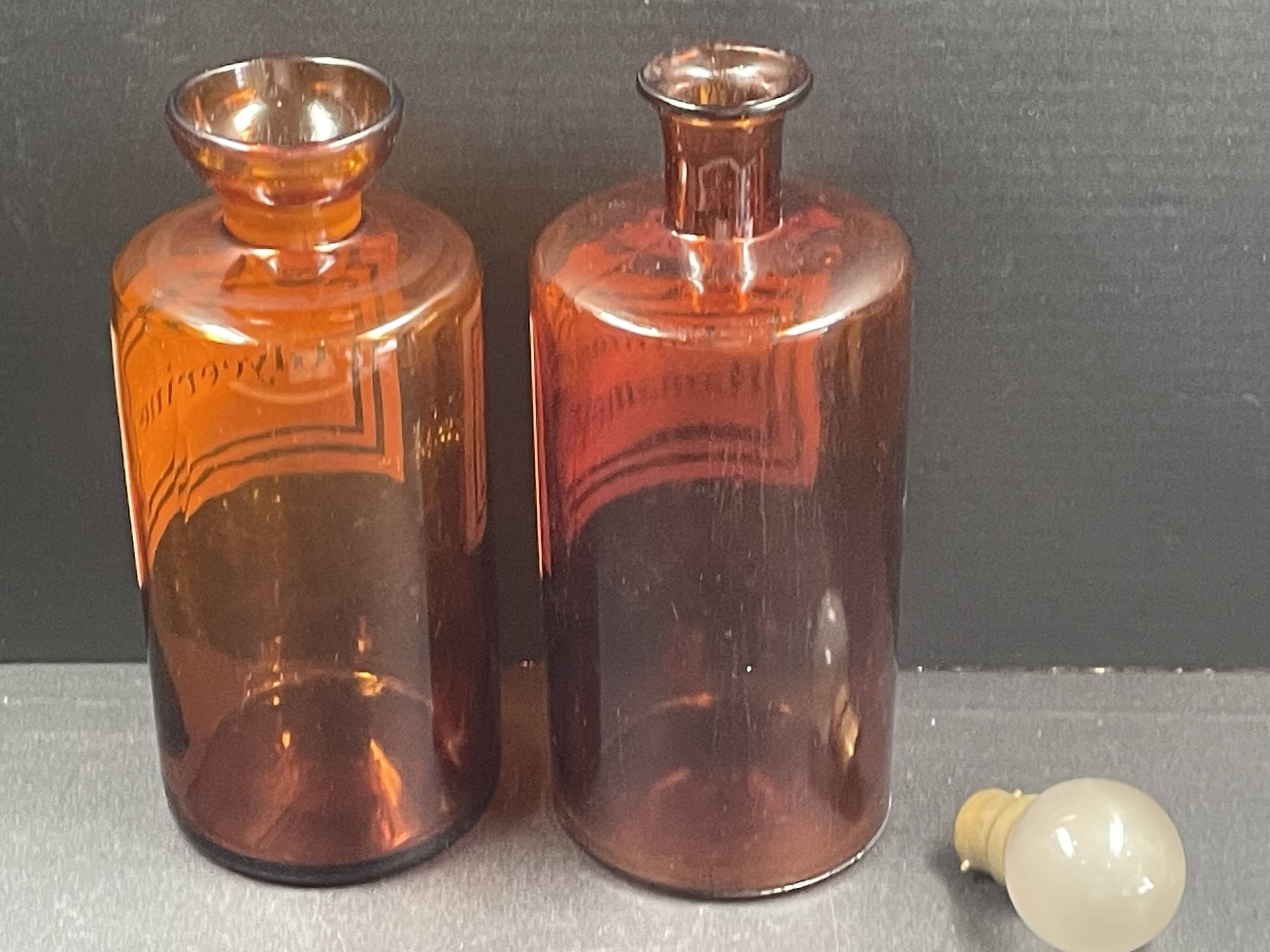 Antique apothecary pots in amber glass, set of 2 - 22 cm