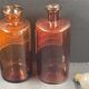 Antique apothecary pots in amber glass, set of 2 - 22 cm
