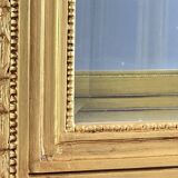 Carved and gilded wooden display cabinet, Louis XVI style, 20th century.