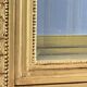 Carved and gilded wooden display cabinet, Louis XVI style, 20th century.