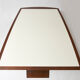 Brutalist conference table made of wood and steel