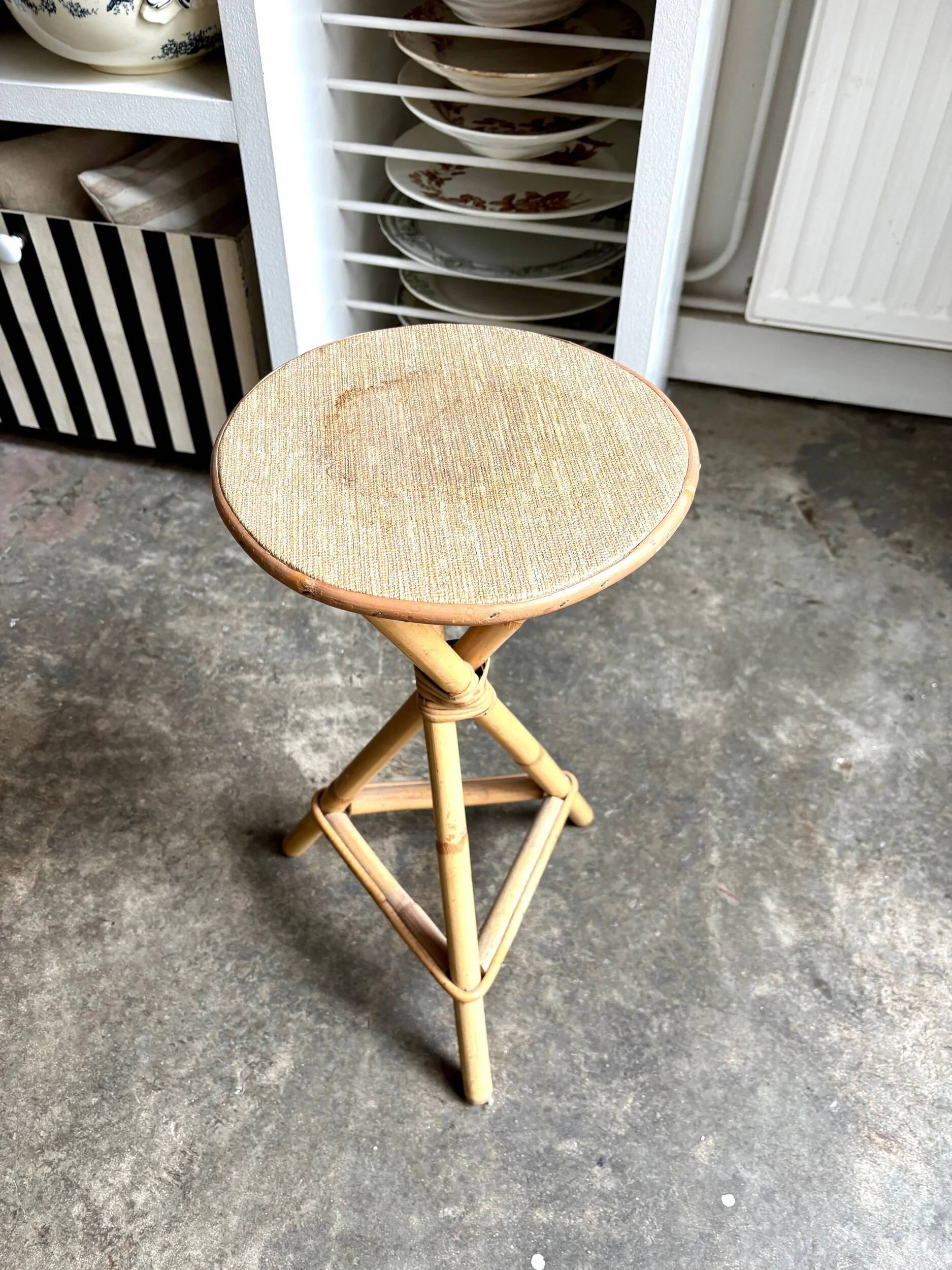 Tripod stool in rattan