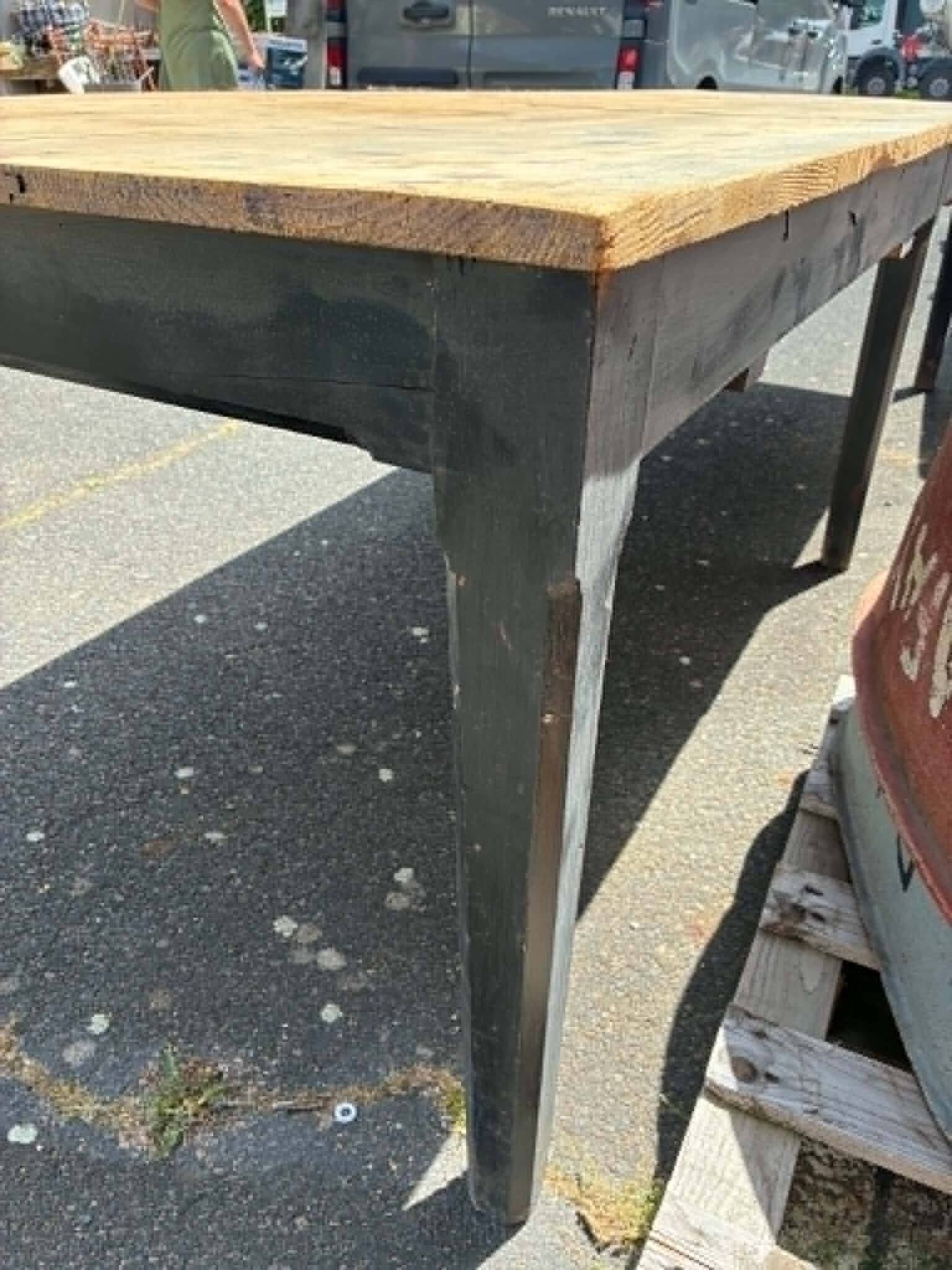 Black dining table in fir.