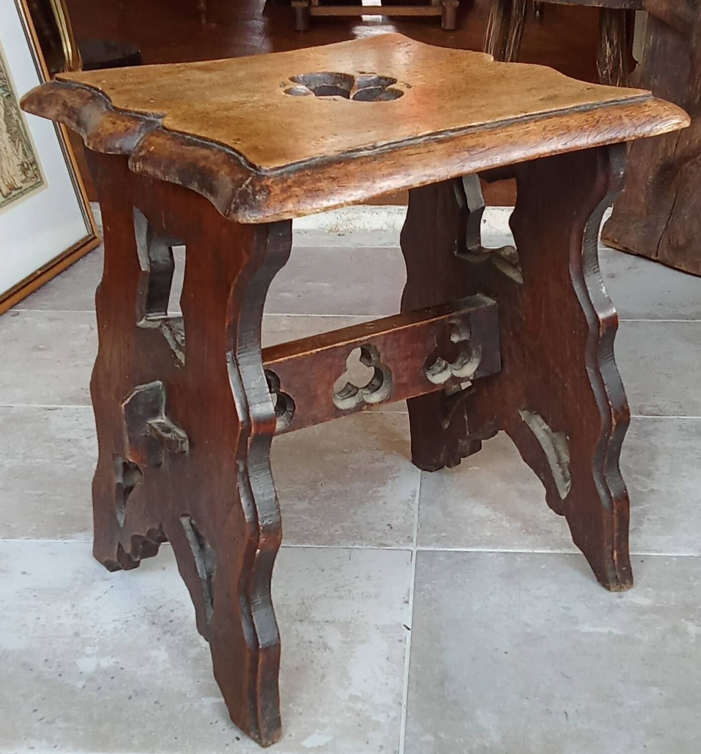 Pair of antique carved wooden stools