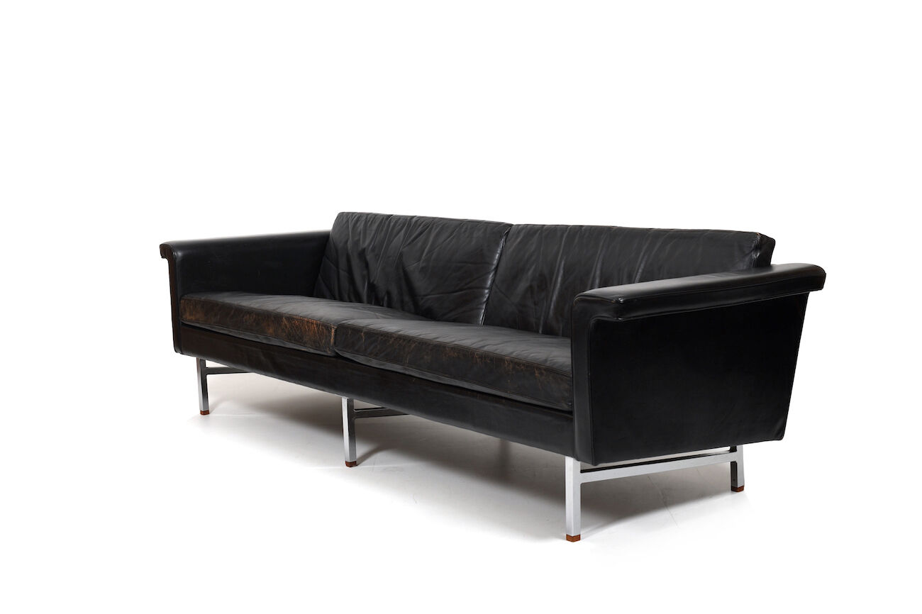 Danish leather sofa with chrome legs and teak ends