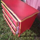 Matte gold and red patinated chest of drawers