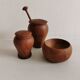 Small, beautiful lot consisting of a salt cellar, pepper shaker and honey jar.