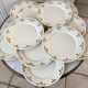 Set of 11 dessert plates Badonviller 30s