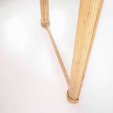 Illuminated “coconut tree” mirror in rattan