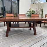 Rectangular dining table set and its suite of 6 armchairs in exotic wood and bamboo.