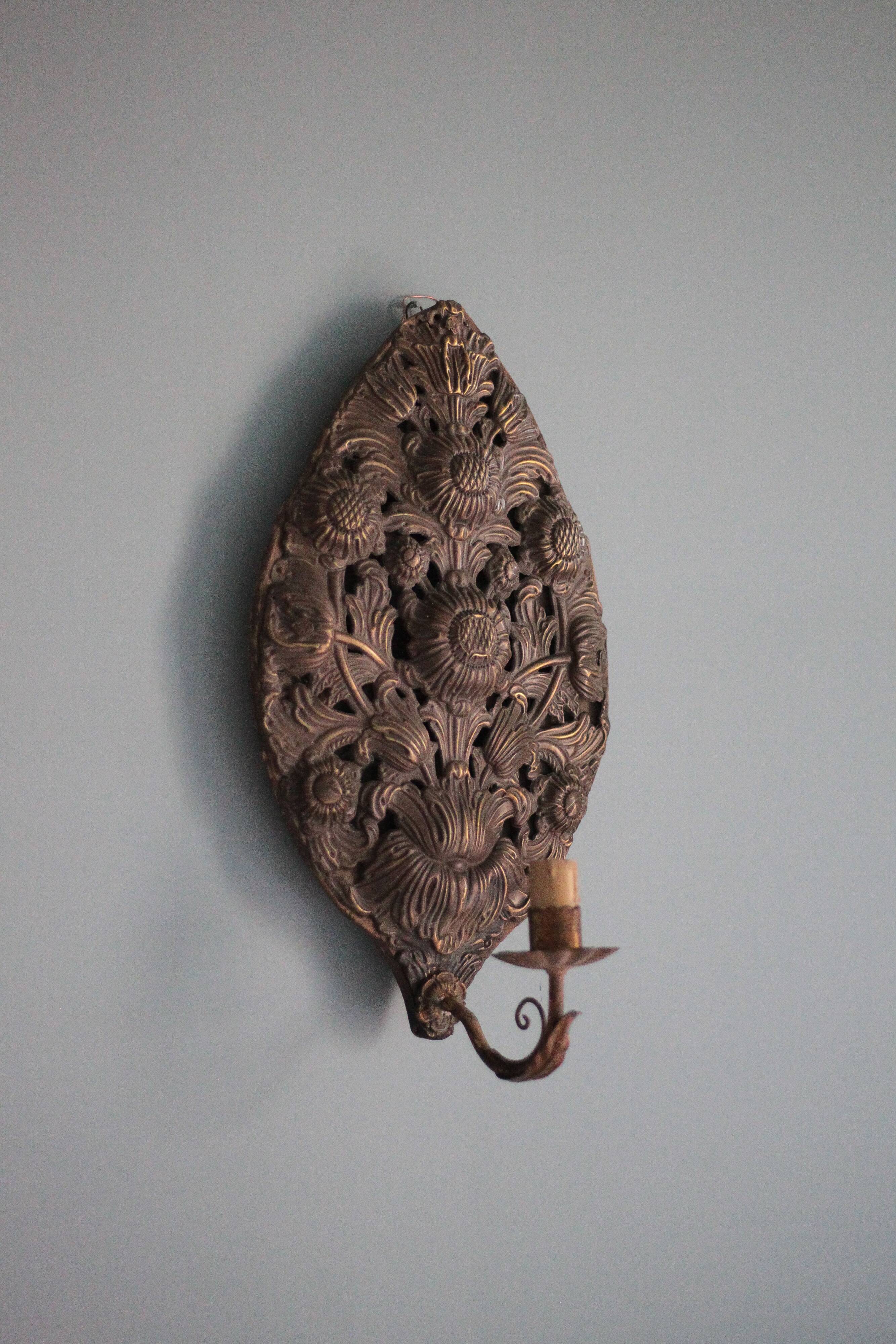 Pair of wall sconces in embossed brass with floral patterns, wall lamp, sconce.