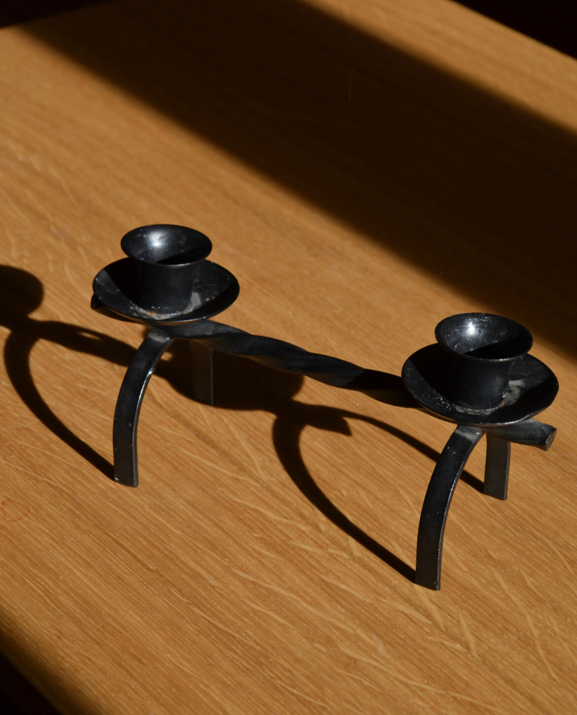 Brutalist candle holder in black iron