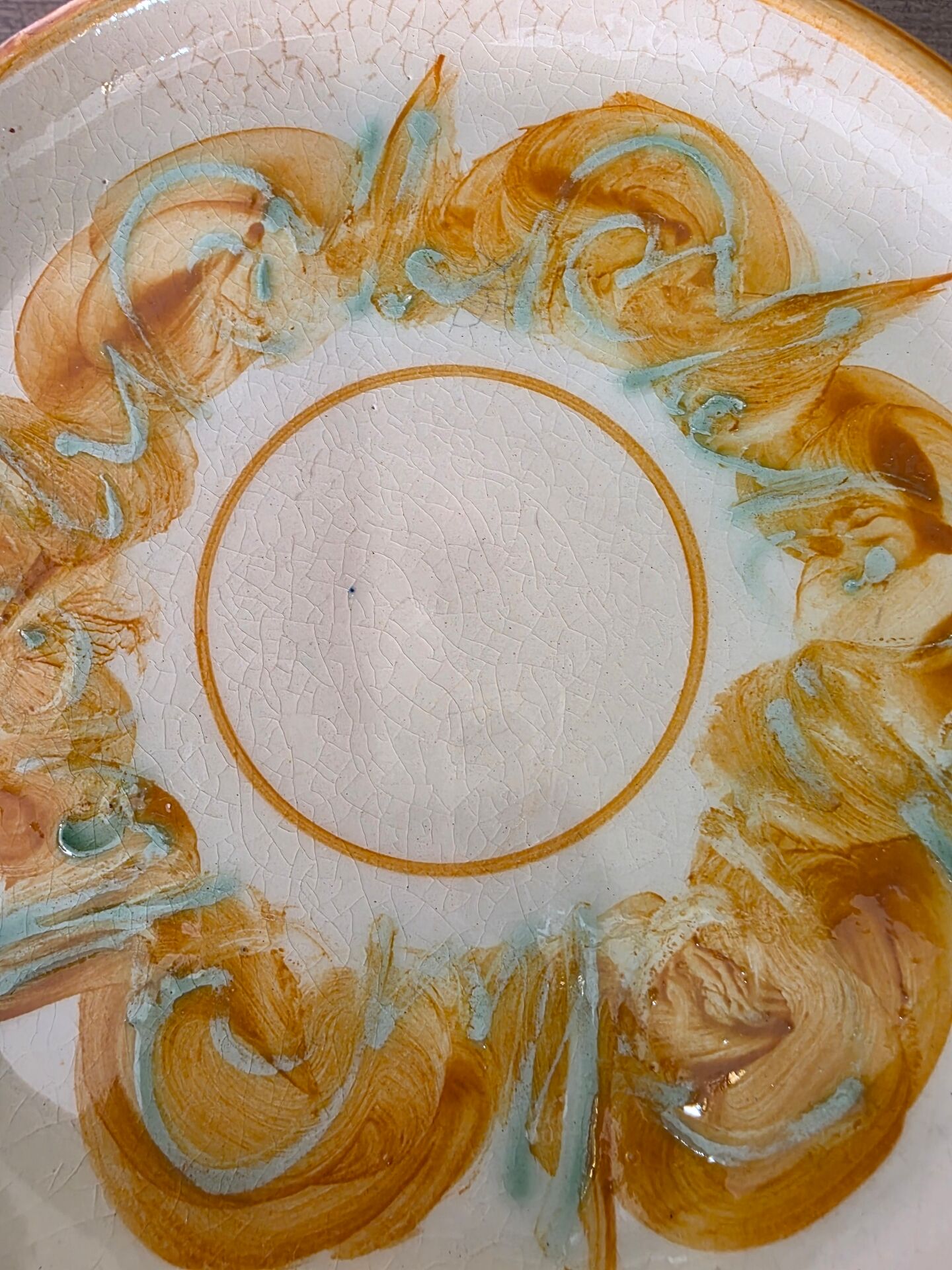 8 vintage dessert plates with a signed decoration.