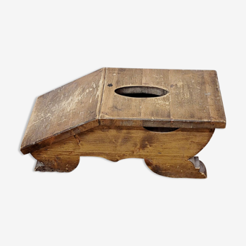 Old wooden footrest stool