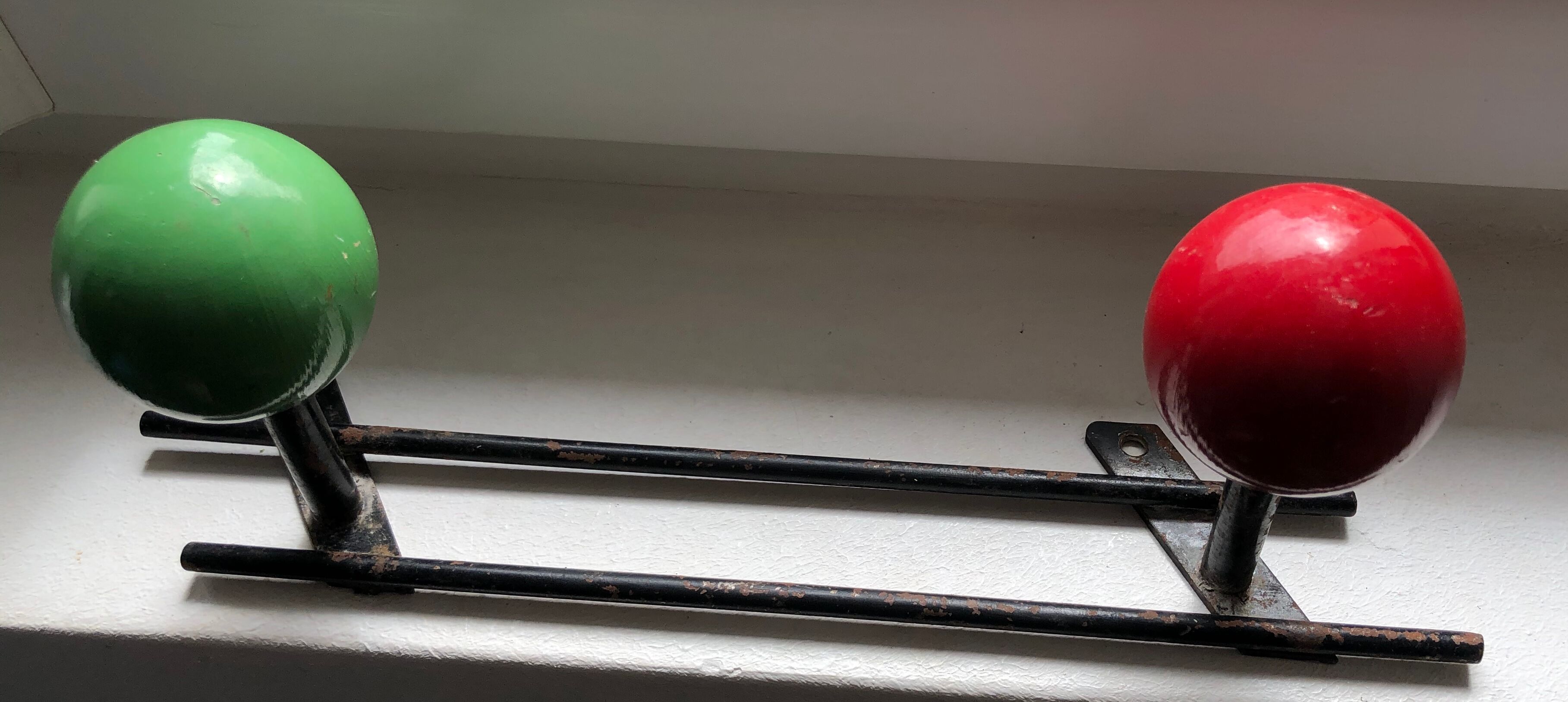 Patère two vintage balls wears old coat