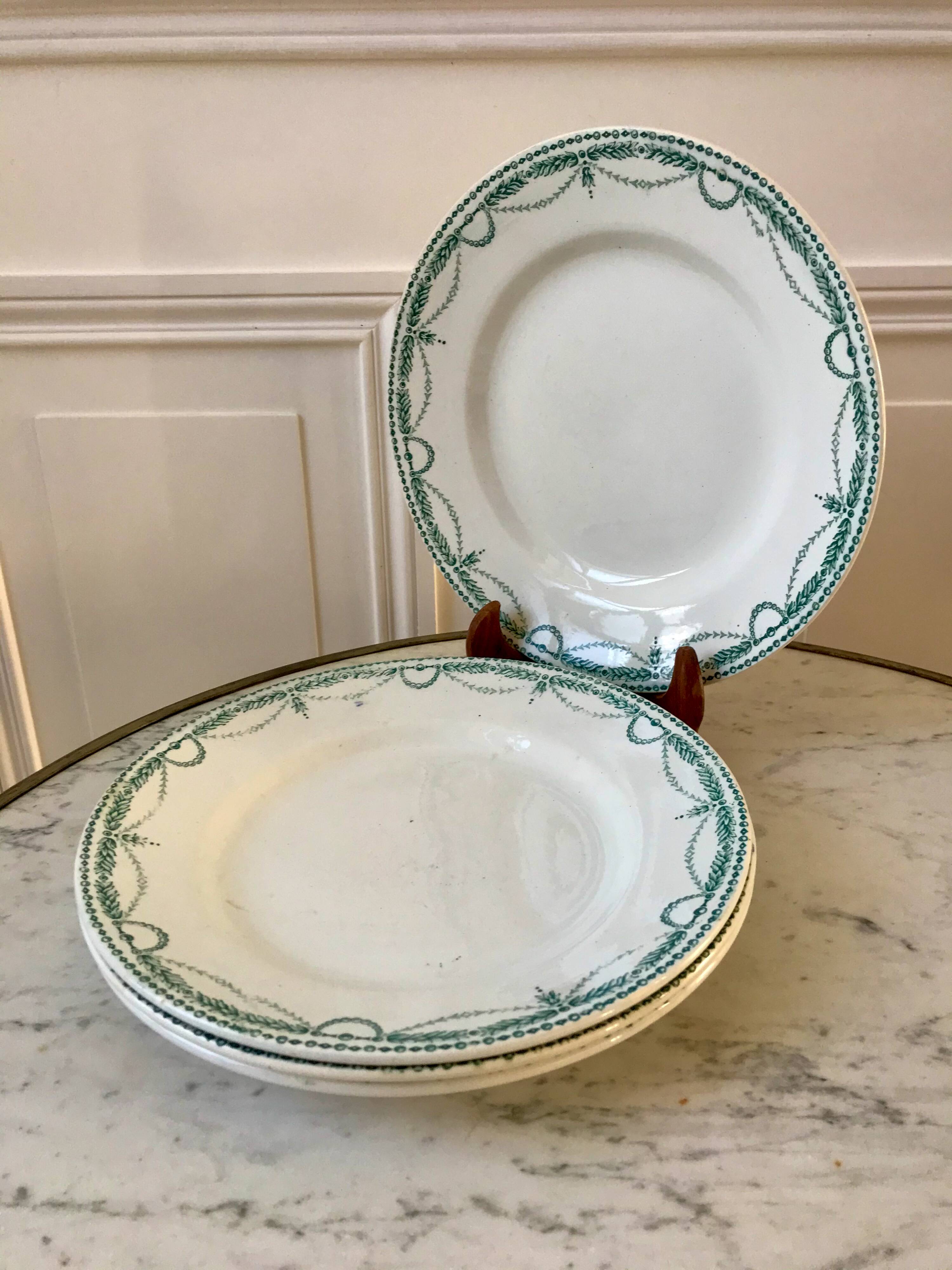 set of 4 flat plates in Terre de Fer Saint Amand model René 19th century