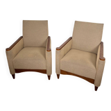 Pair of armchairs in carved wood and vintage fabric