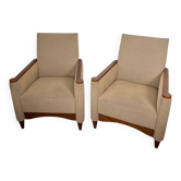 Pair of armchairs in carved wood and vintage fabric