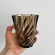 Smoked glass vase with twisted design