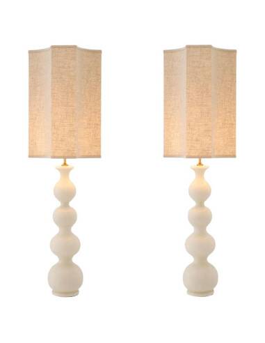 Paire de lampes de table en céramique blanche craquelée et laiton patiné.