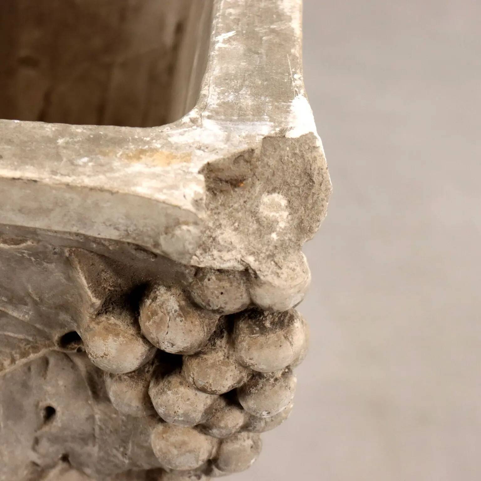 Antique plaster vase decorated with bunches of grapes, Italy, 19th century.
