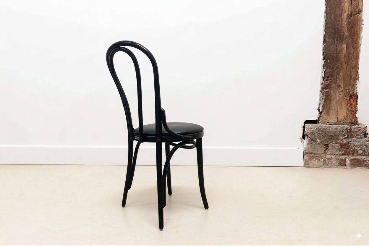 Satelliet No. 18 black upholstered bistro chair