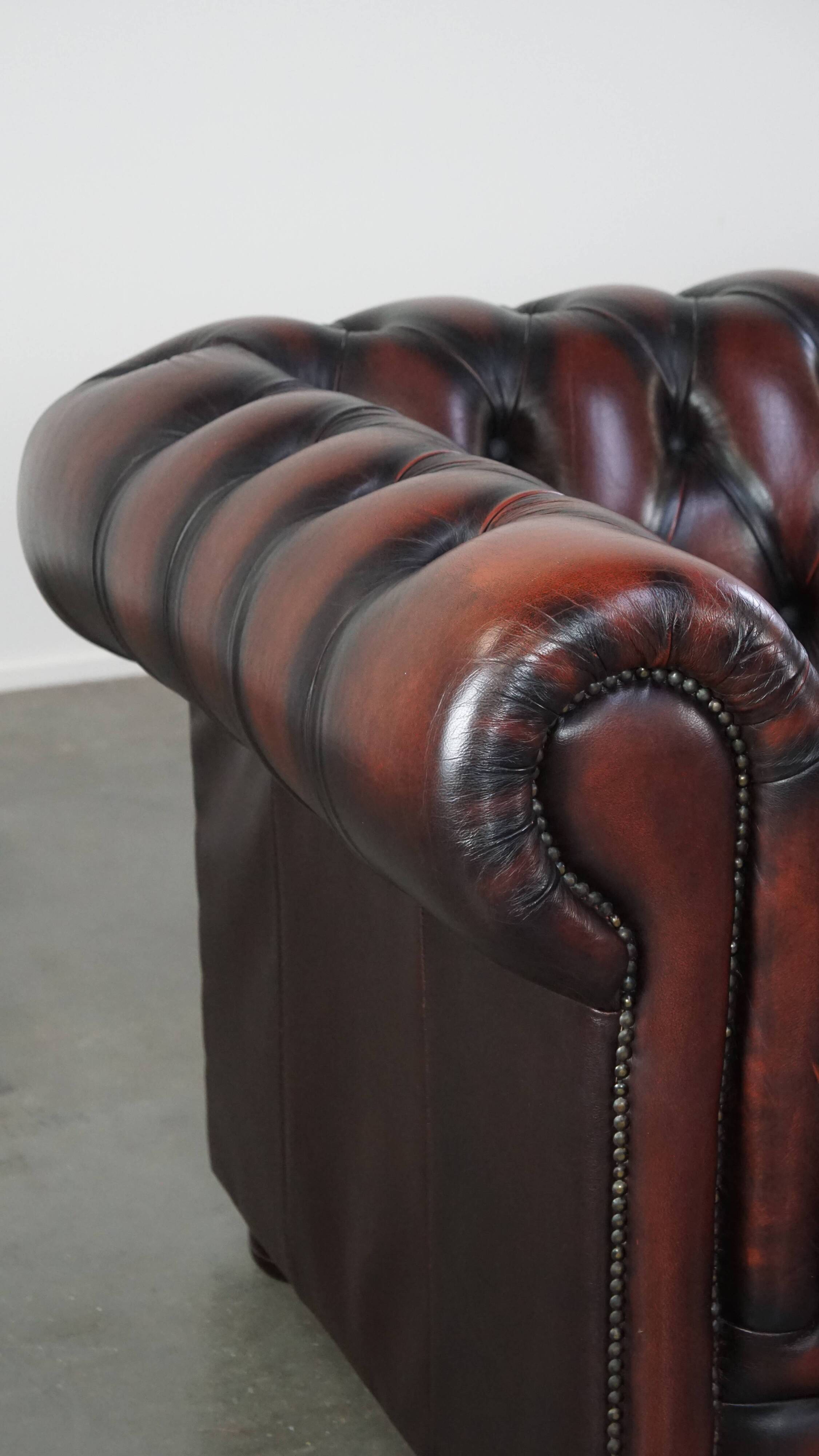 Chesterfield 2.5 seater sofa in dark red cowhide leather
