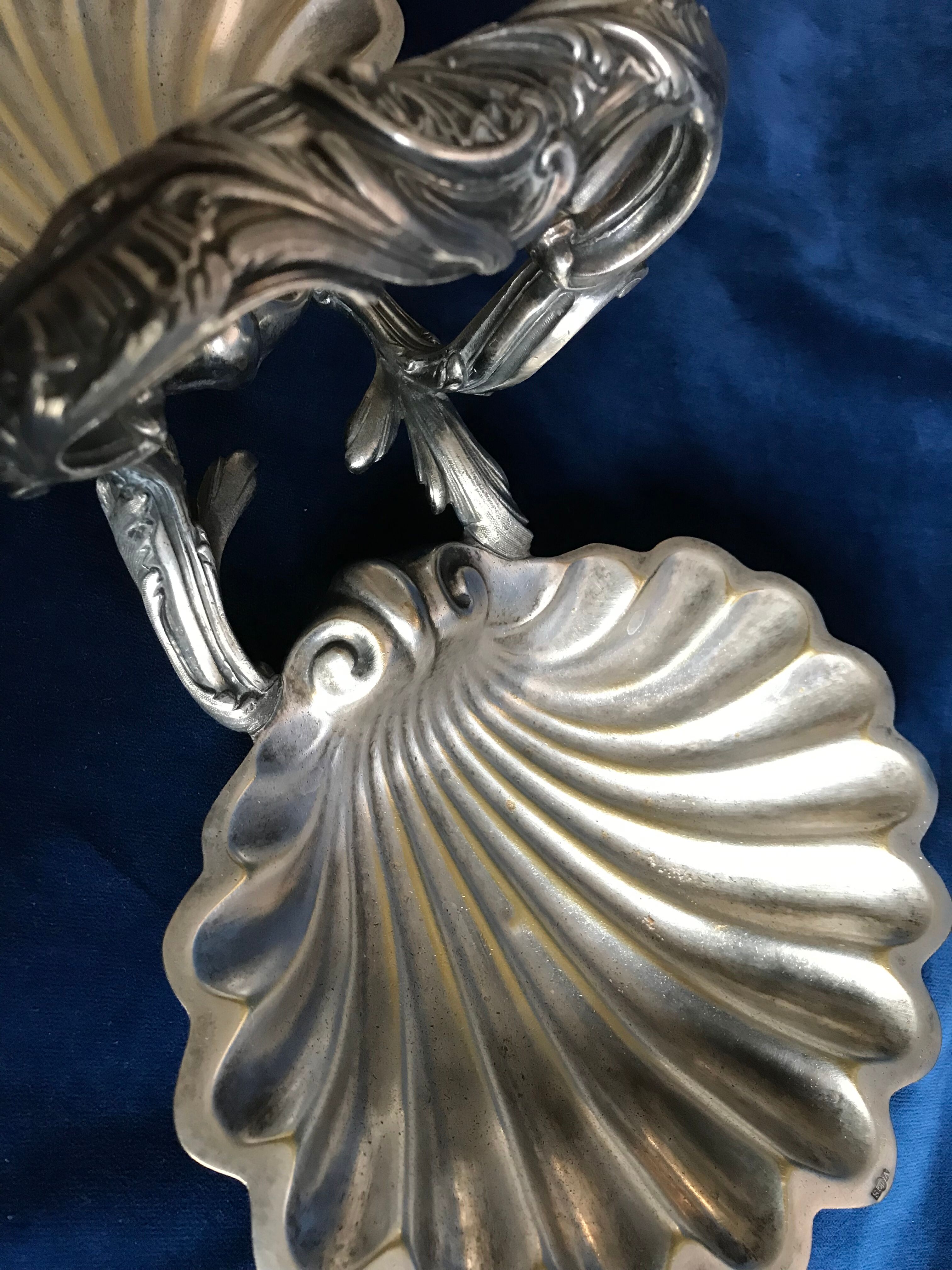 Old beggar in silver bronze