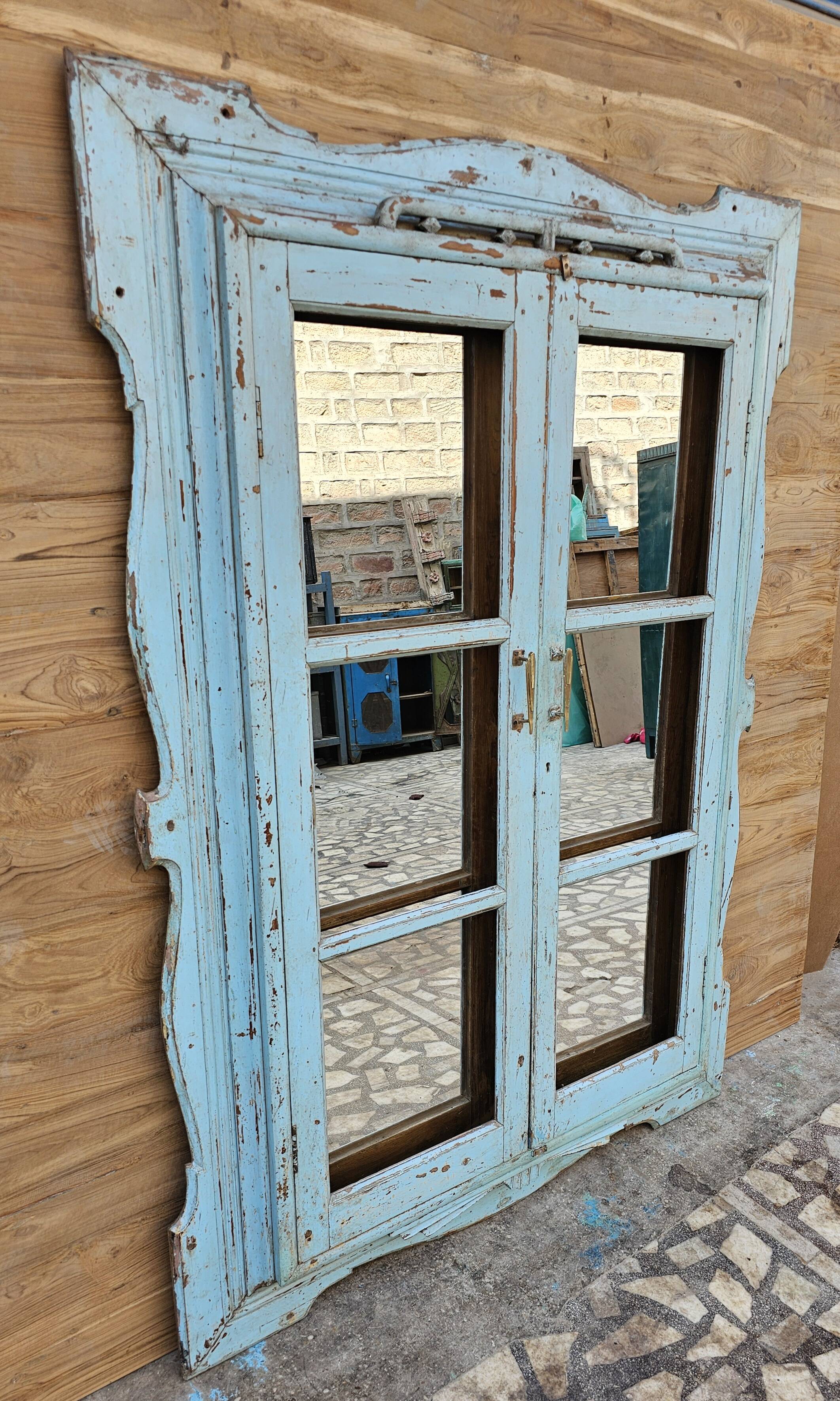 Art Deco mirror in Burmese teak