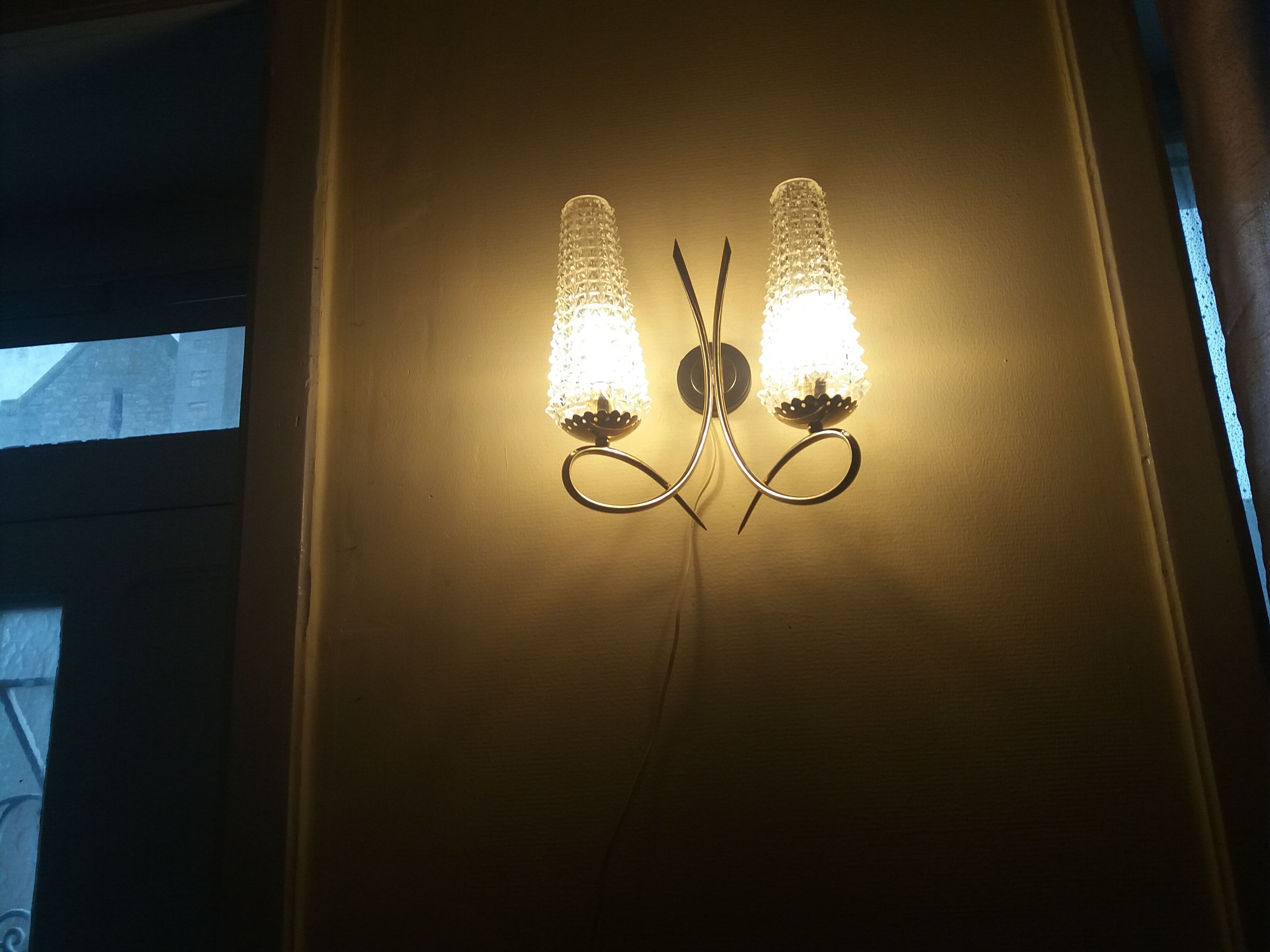 Sconce from the 1960s in brass and glass