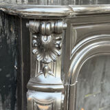 Louis XV style fireplace in black Belgian marble, circa 1880.