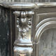 Louis XV style fireplace in black Belgian marble, circa 1880.