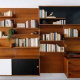 Immense teak library wall