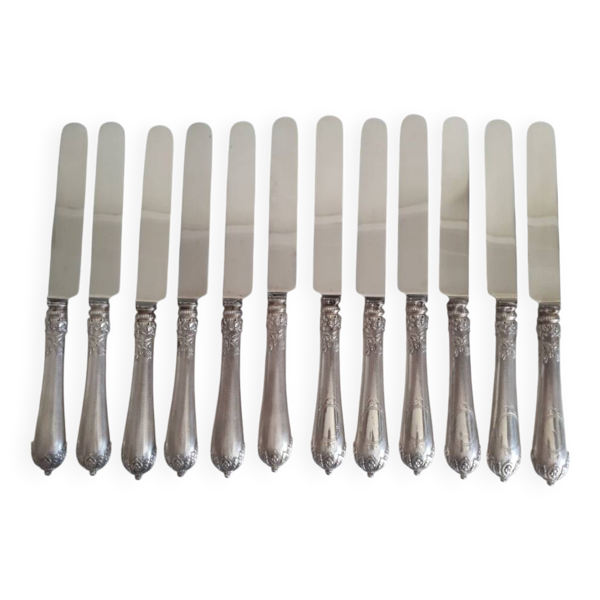 12 couteaux manche en argent fourré