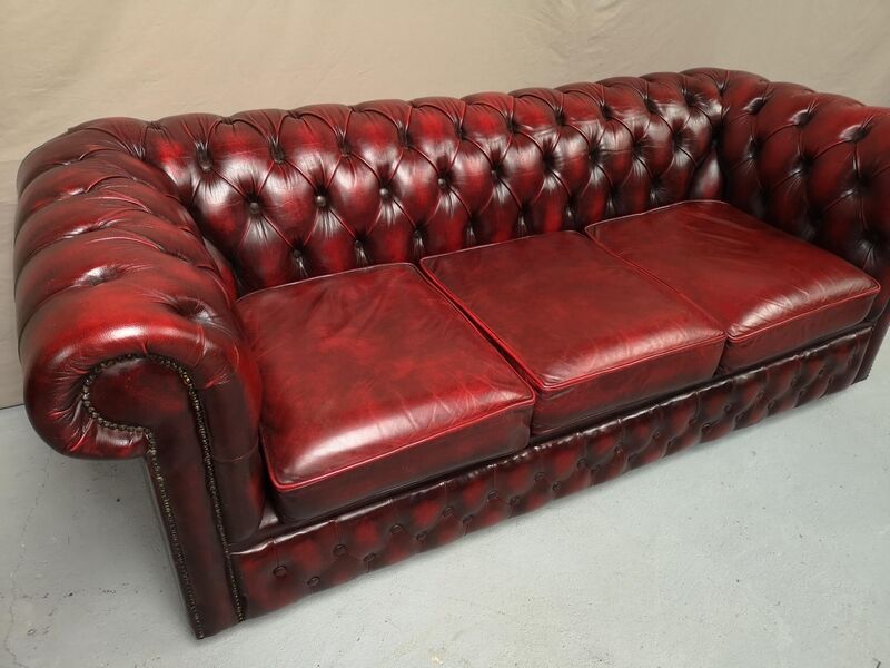 Red chesterfield sofa three seats