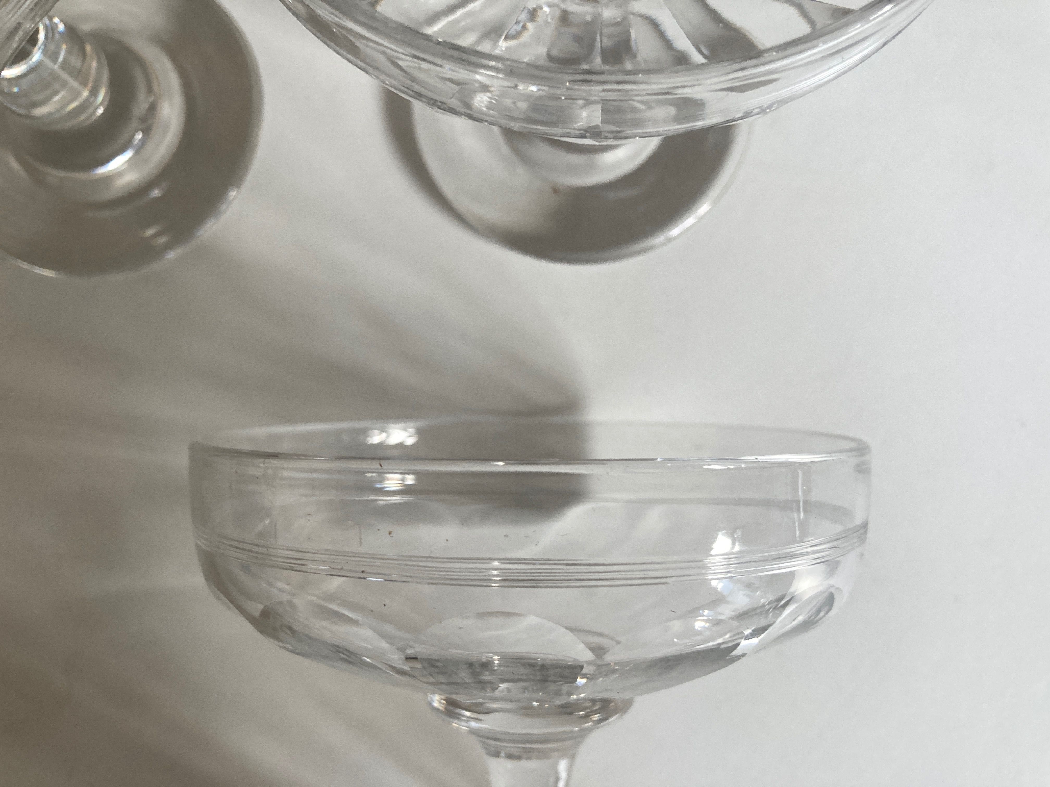 Set of 10 glasses of champagne 1870 in crystal ringing with flat ribs