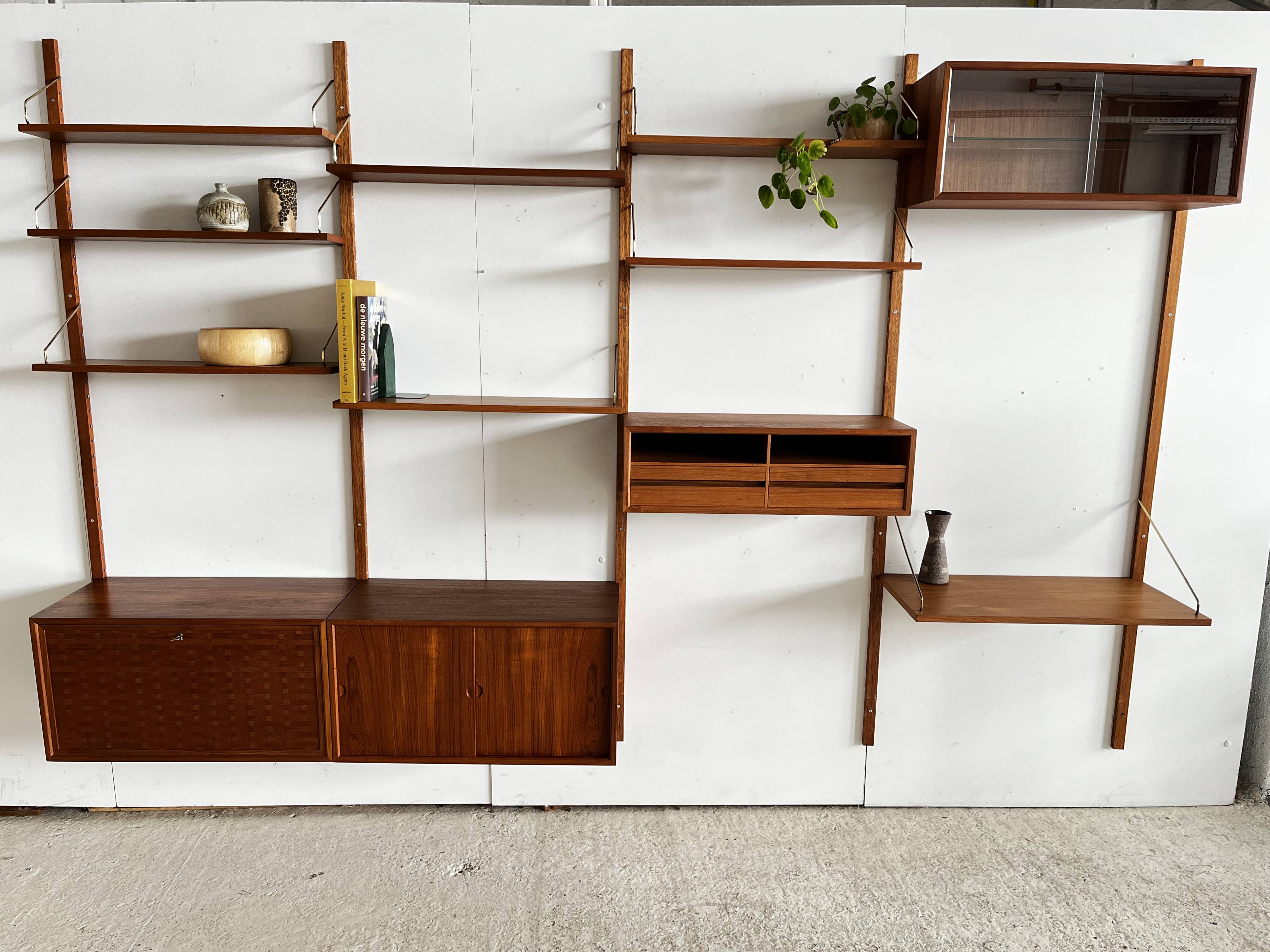 A wall unit with 4 compartments by Poul Cadovius, Denmark, 1960s.