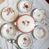 Mismatched old soup plates accompanied by a soup tureen