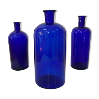 Trio of apothecary bottles in cobalt blue glass