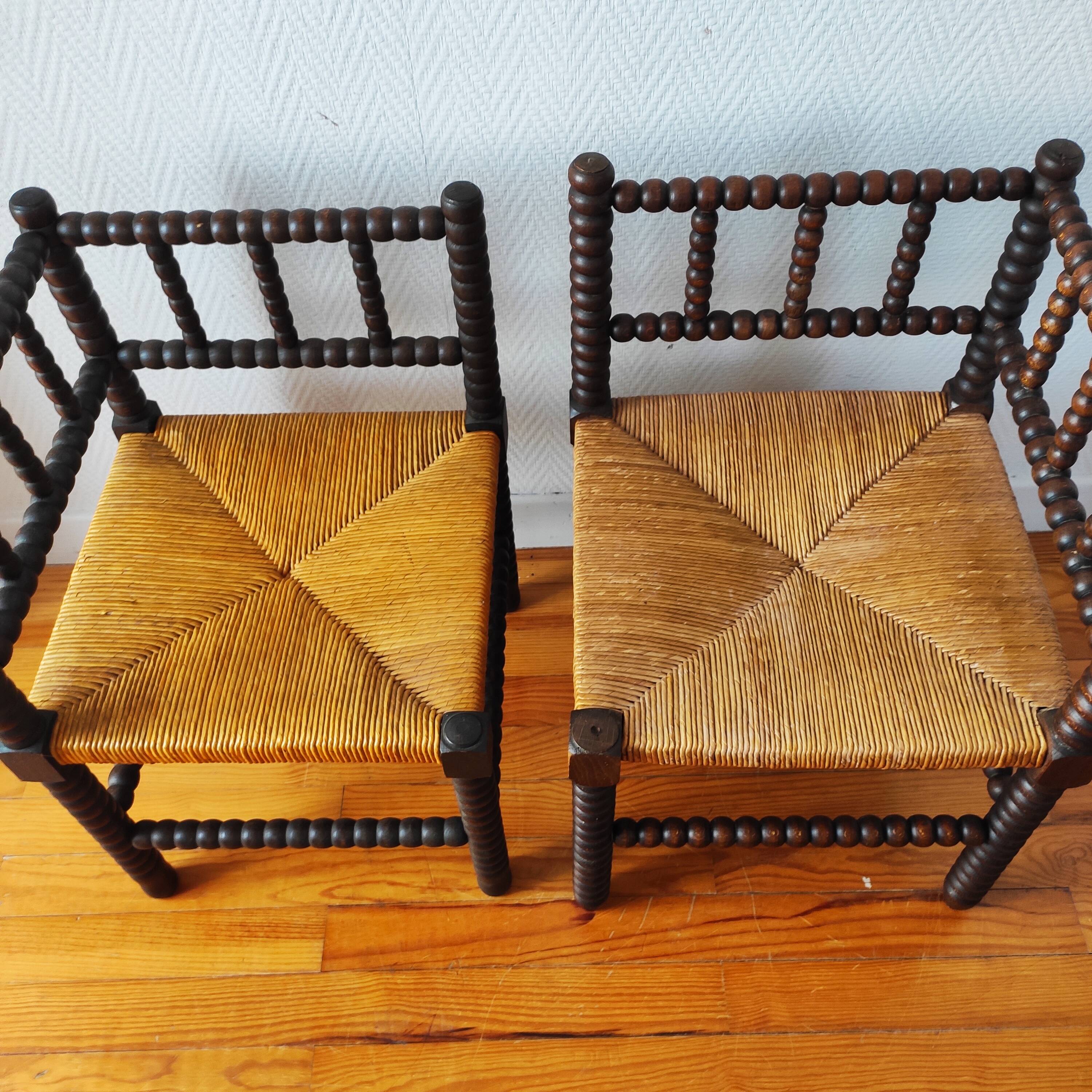 Pair of French corner chairs - turned wood, mid-20th century.