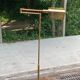 Italian floor lamp in gilded brass with swing arm
