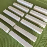 Set of 12 vintage knife rests in polished bone - ivory look, minimal