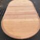 Extendable round farmhouse dining table restored in solid oak from the 19th century