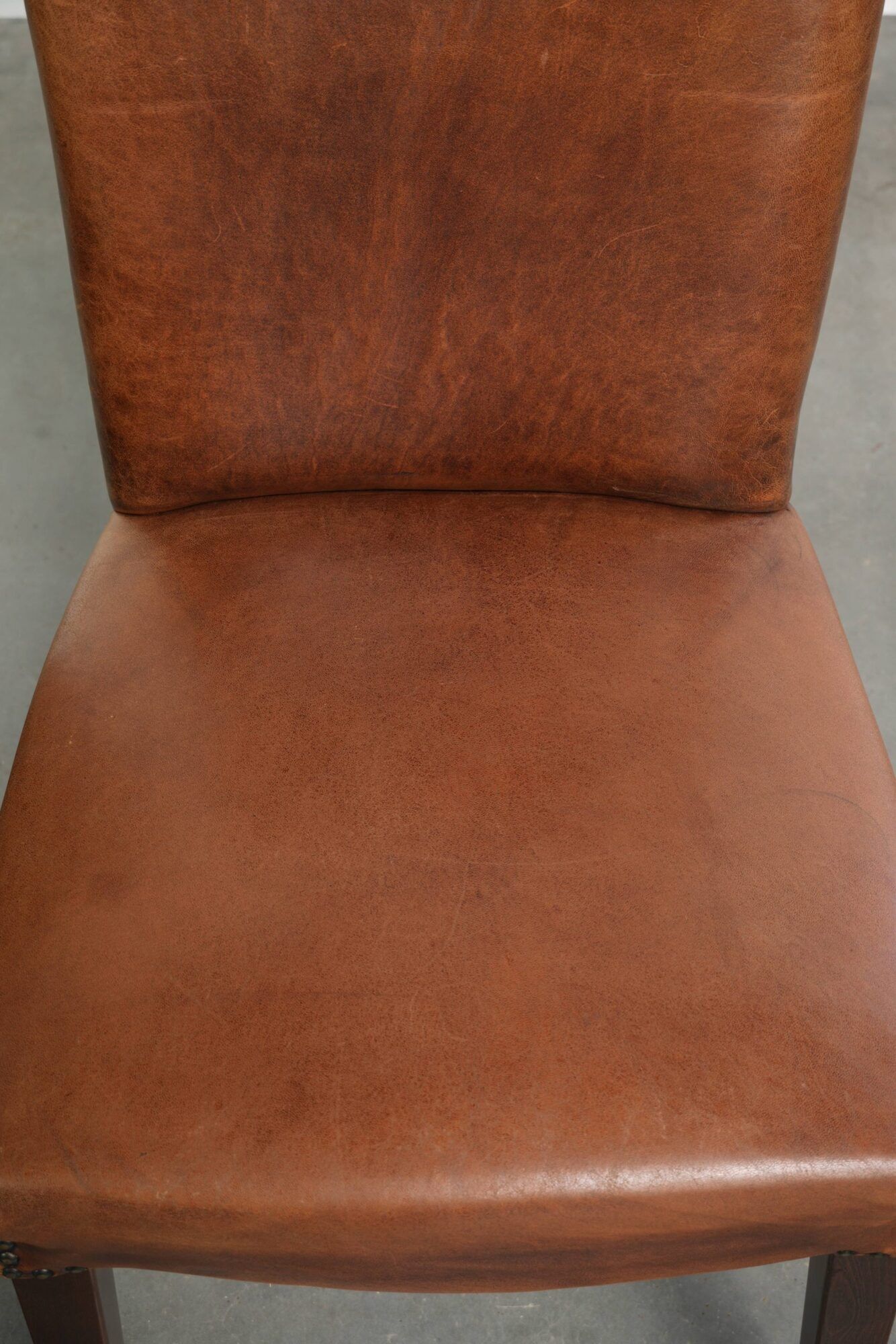 Set of 6 sheepskin dining chairs in a cognac colour with a lovely patina